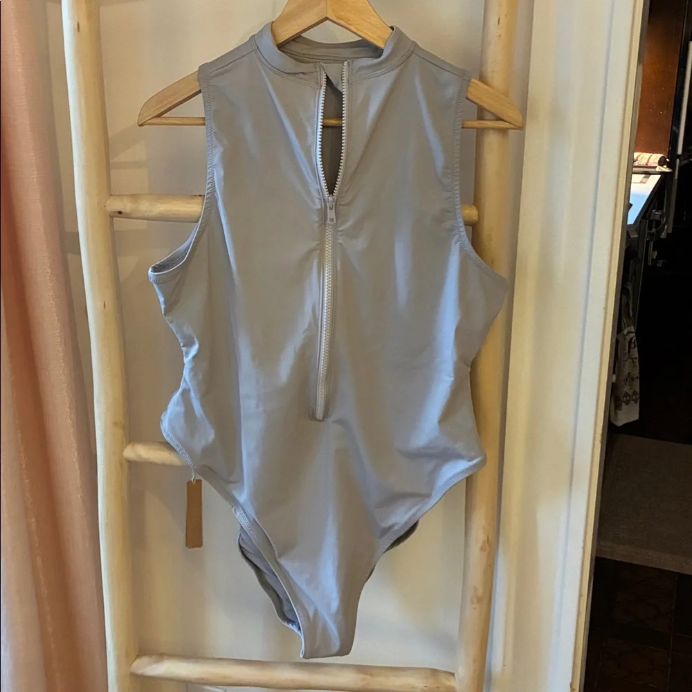 Skims recycled swim sleeveless one piece.